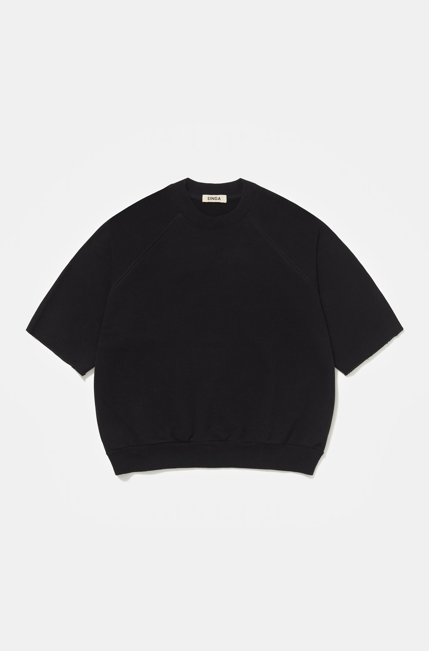 OVER RAGLAN PUNHOS - PRETO
